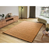 Alfombra a medida Atlas Liso Camel en el salón | Atticgo