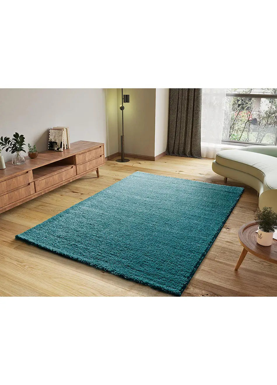 Alfombra a medida Atlas Liso Aqua en el salón | Atticgo