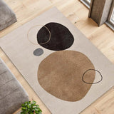 Alfombra abstracta salón círculos Lessia Peblinne Beige y Negro Atticgo