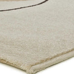 Alfombra abstracta esquina círculos Lessia Peblinne Beige y Negro Atticgo