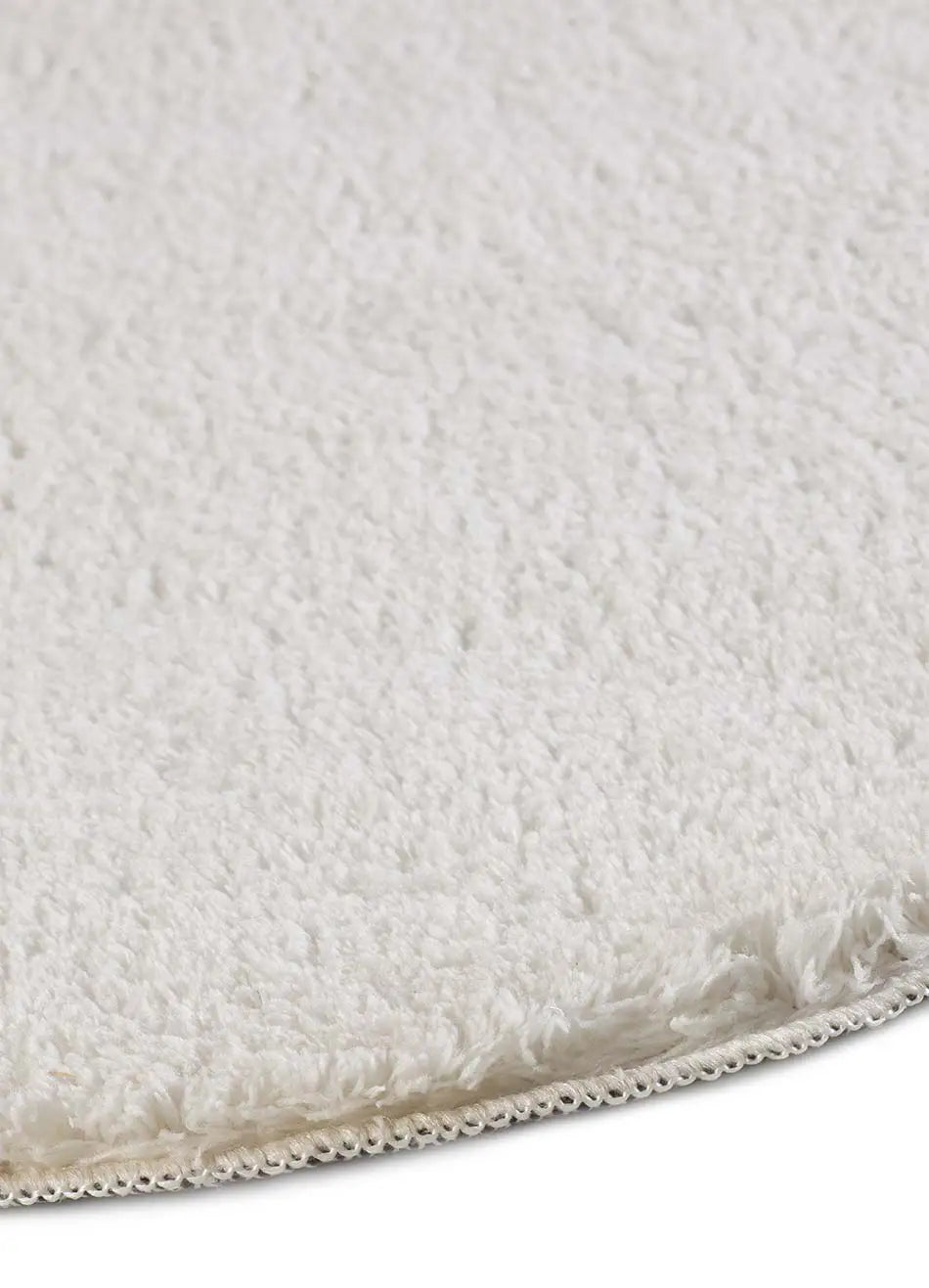 Detalle alfombra lavable con borde ondulado blanco Mellow Atticgo