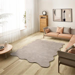 Alfombra lavable para salón con borde ondulado piedra Mellow Atticgo