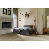 Alfombra a medida Orion Lis Verde en el salón | Atticgo