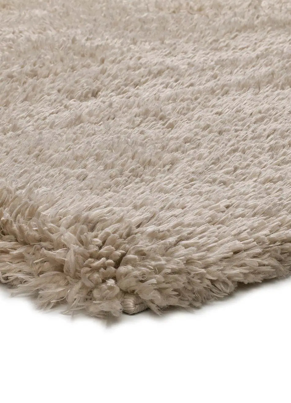 Alfombra shaggy reciclada beige esquina | Atticgo