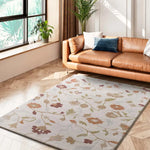 Salón con alfombra con motivos florales en colores empolvados Tamaris 16807 Multicolor Atticgo