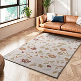 Ambiente con alfombra con motivos florales en colores empolvados Tamaris 16807 Multicolor Atticgo