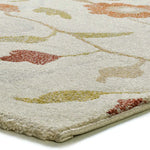 Detalle alfombra con motivos florales en colores empolvados Tamaris 16807 Multicolor Atticgo