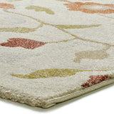 Detalle alfombra con motivos florales en colores empolvados Tamaris 16807 Multicolor Atticgo