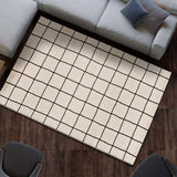 Alfombra geométrica blanco y negro salón Touza 12880 Atticgo