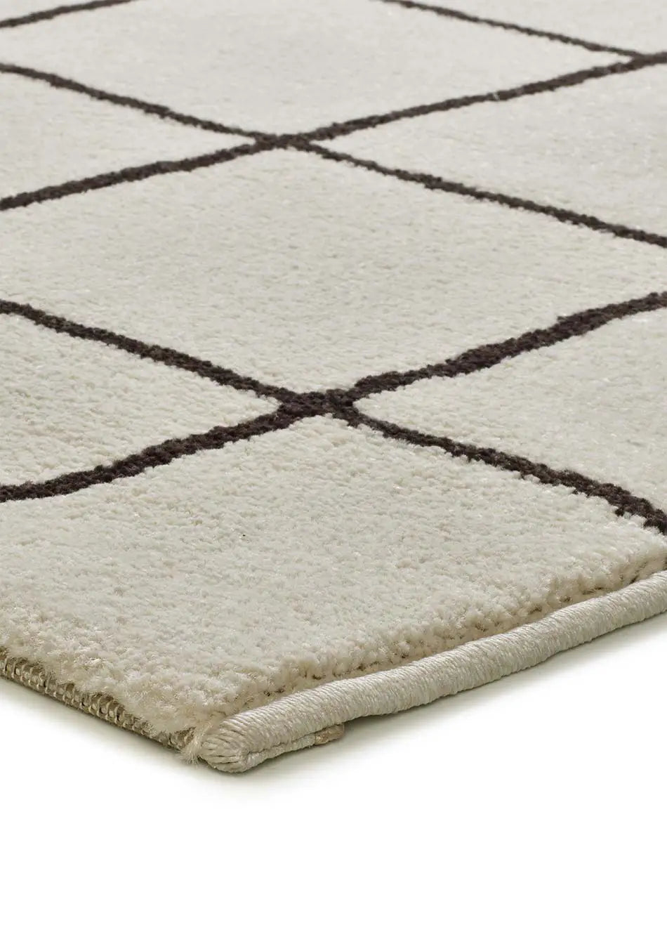 Alfombra geométrica blanco y negro esquina Touza 12880 Atticgo