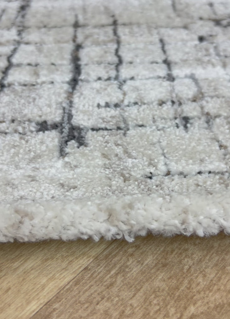 Alfombra suave en colores neutros